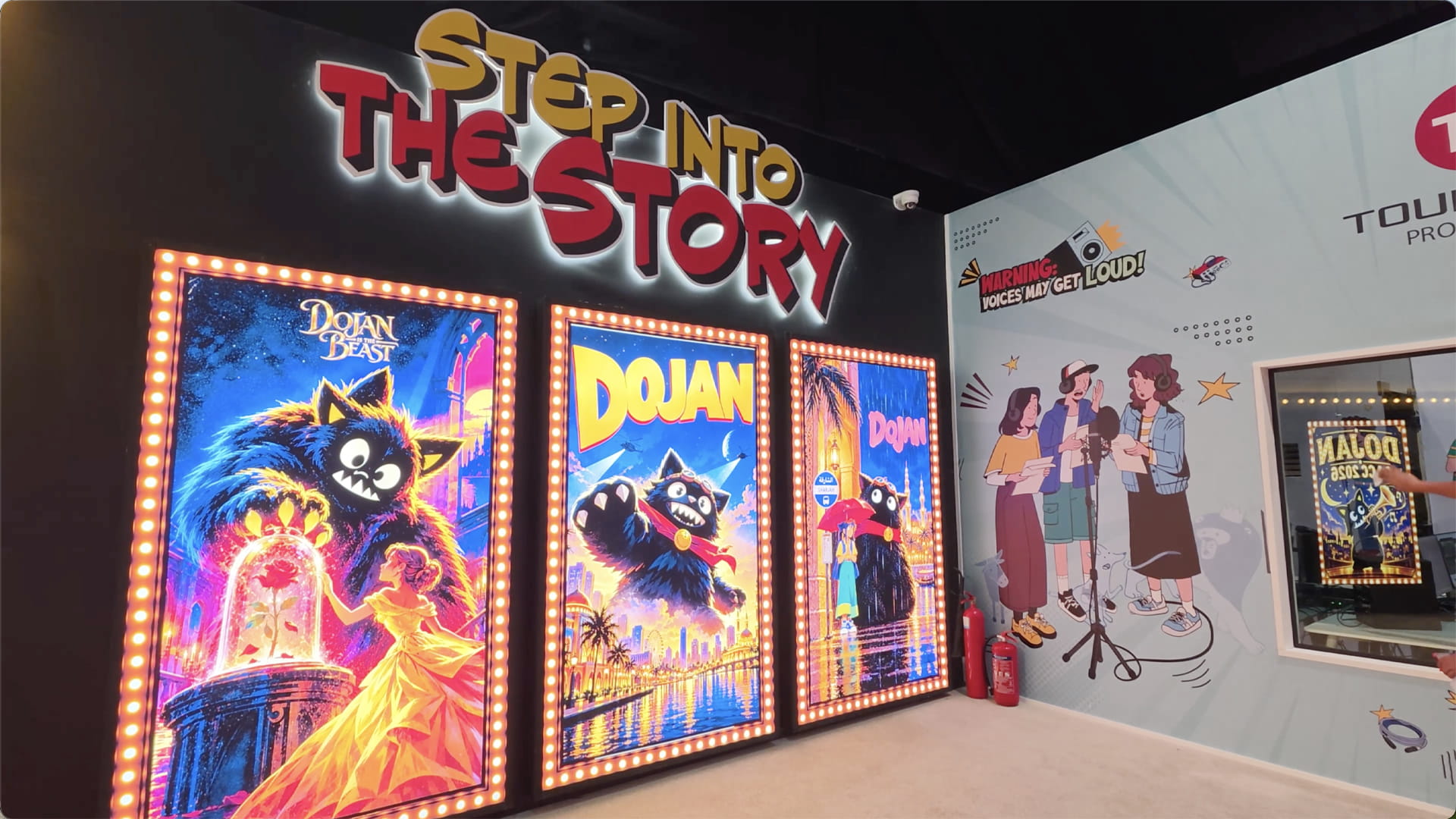 A professional workshop or exhibition hall at Aljada featuring displays of animation and comic book art.