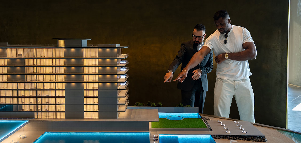 Architectural rendering of the Armani Beach Residences at Palm Jumeirah featuring modern glass facades and waterfront